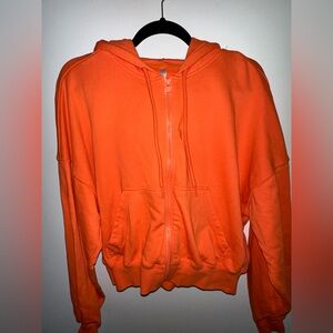 FABLETICS SHRUNKEN HOODIE IN PASSION ORANGE/ CABANA GREEN SIZE L